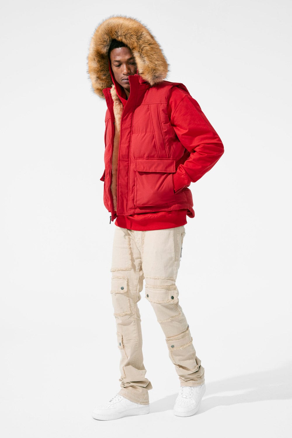 Red puffer with deals fur hood