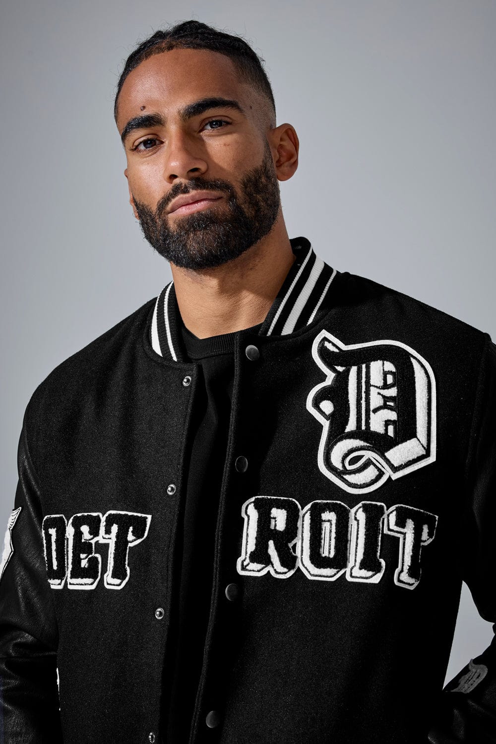 値上げ前今がチャンスJORDAN CRAIG RAIDERS ウールボディJKT Jordan Craig Men's Blocked Puffer Jacket Black BRONX NAVY